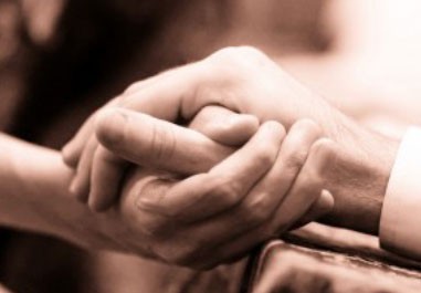 holding hands with Holocaust survivors