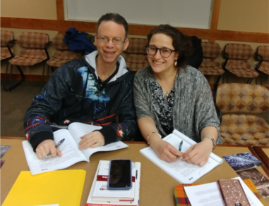 A man and a woman smiling for a picture during a Leadership Training class at Jewish Federation of Northeastern New York