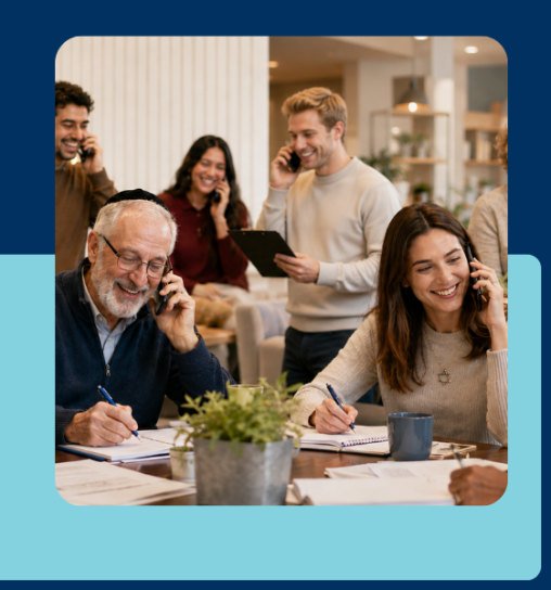 A diverse group of six people engaged in a discussion over the phone at a table, with notebooks and a plant in the center.