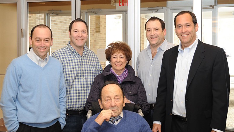 The Fisher family poses for a photo.
