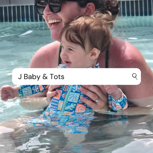 A mother and infant participate in an aquatics parent & me class