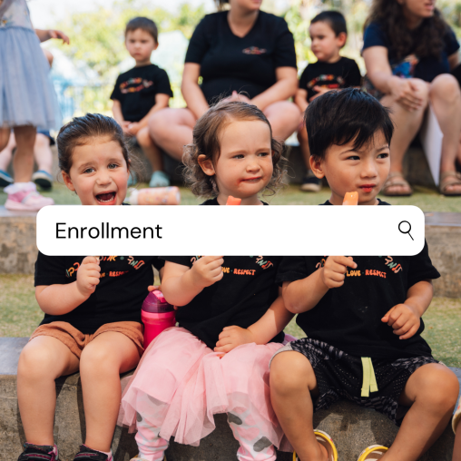 Preschool children eat popsicles in an outdoor classroom environment