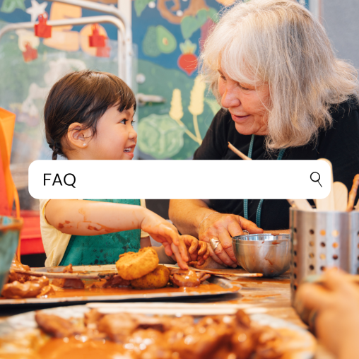A preschool teacher and child participate in hands-on activities in an outdoor classroom environment