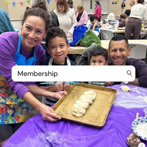 A family makes a challah at a family community event