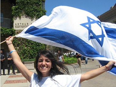 cija advocacy - young woman holding israeli flag