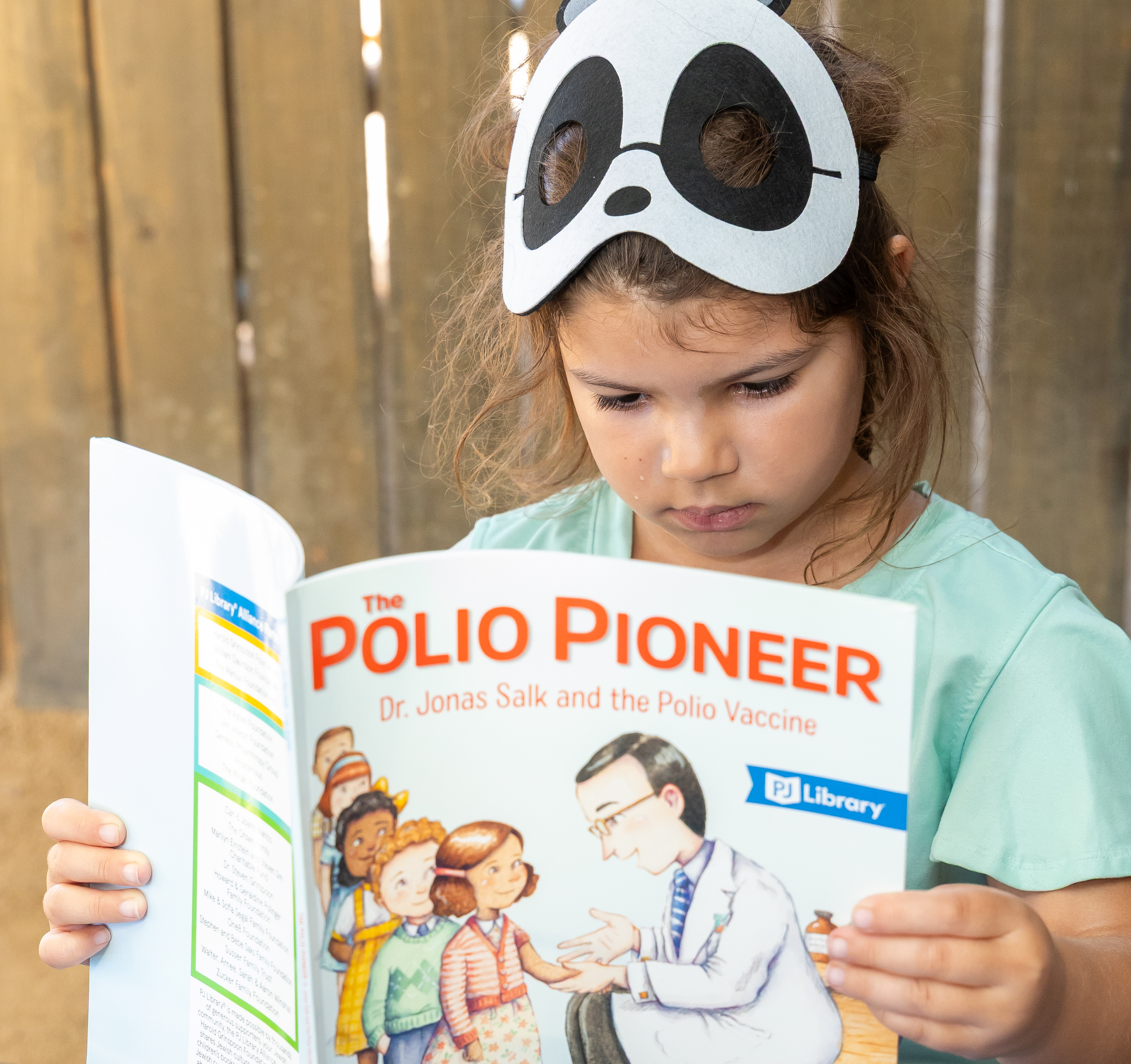 Young family reading together